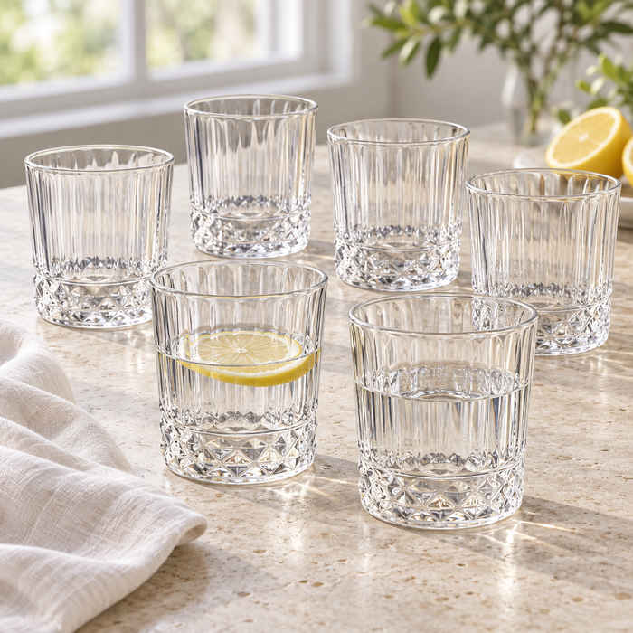 Trinkglas 320 ml transparent mit vertikaler Rillenstruktur